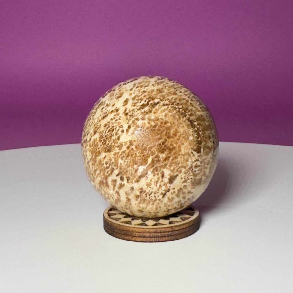 Peruvian Aragonite Sphere with Wood Stand