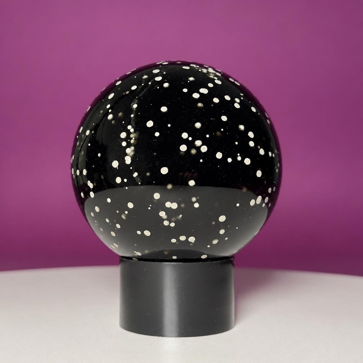 Stardust Obsidian Sphere on Black Acrylic Stand – 535g