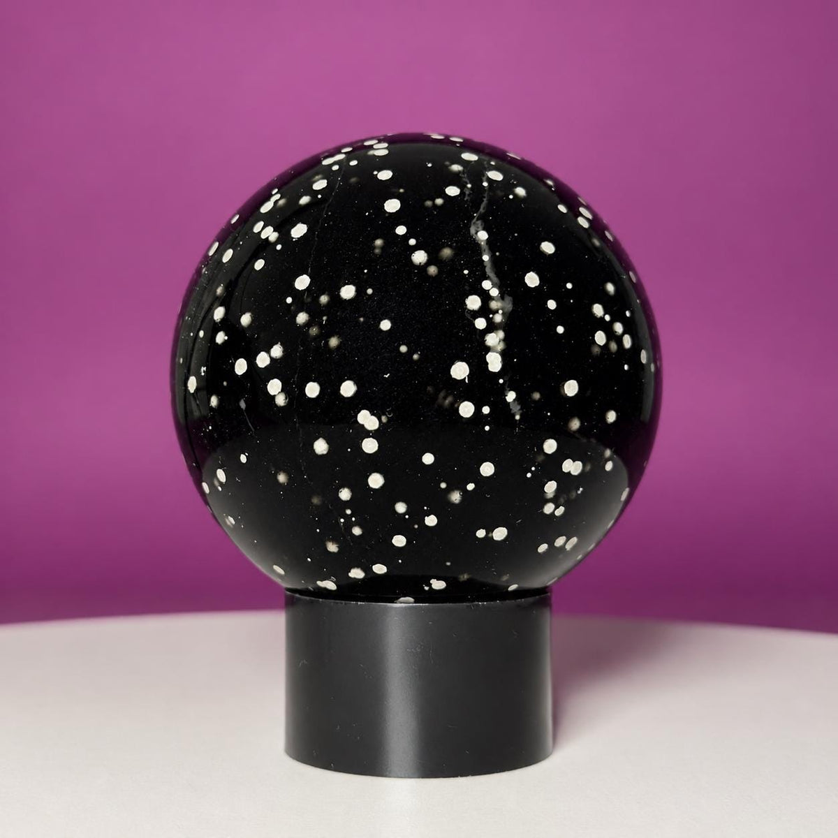 Stardust Obsidian Sphere on Black Acrylic Stand – 535g
