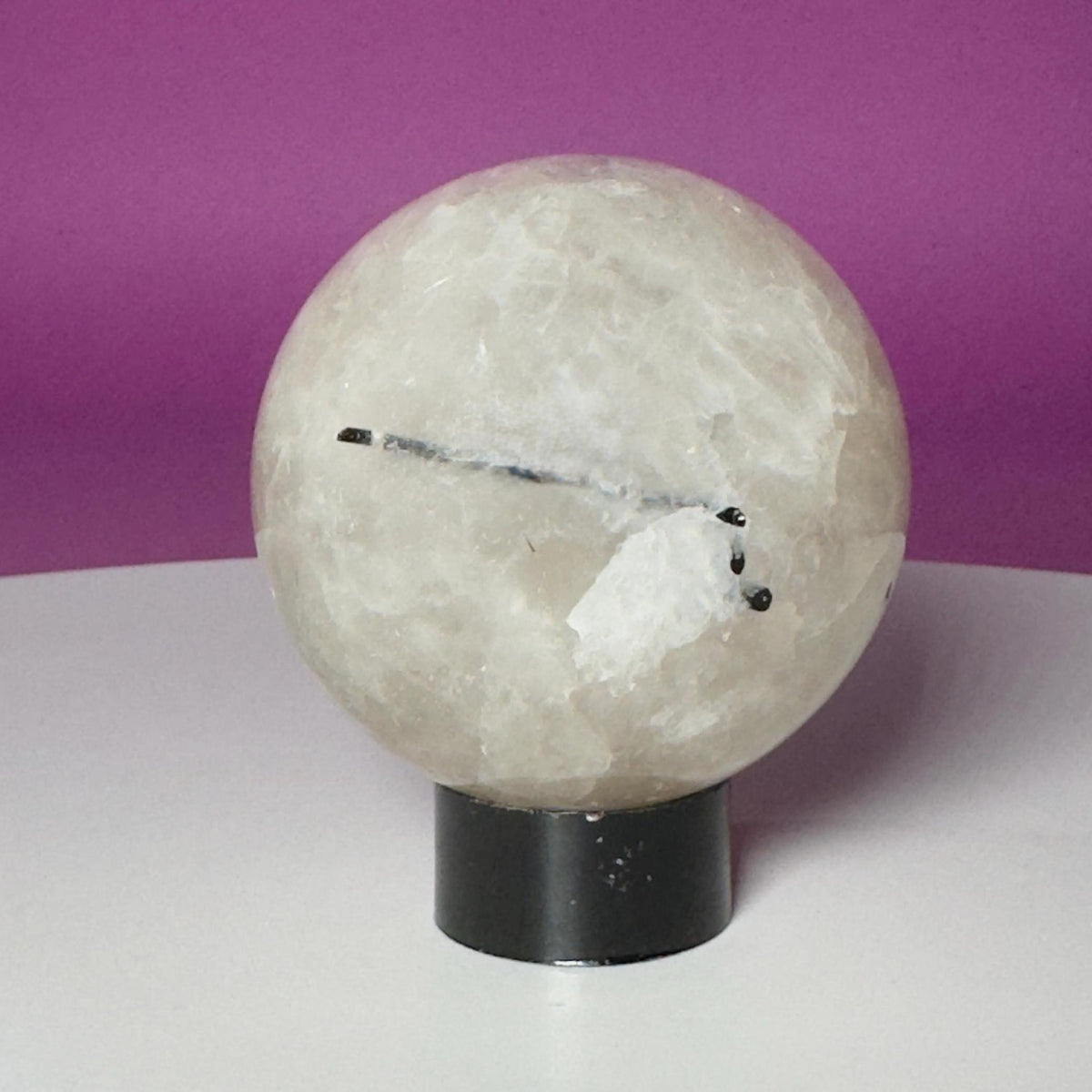 Tourmalinated Quartz Sphere on Black Acrylic Stand