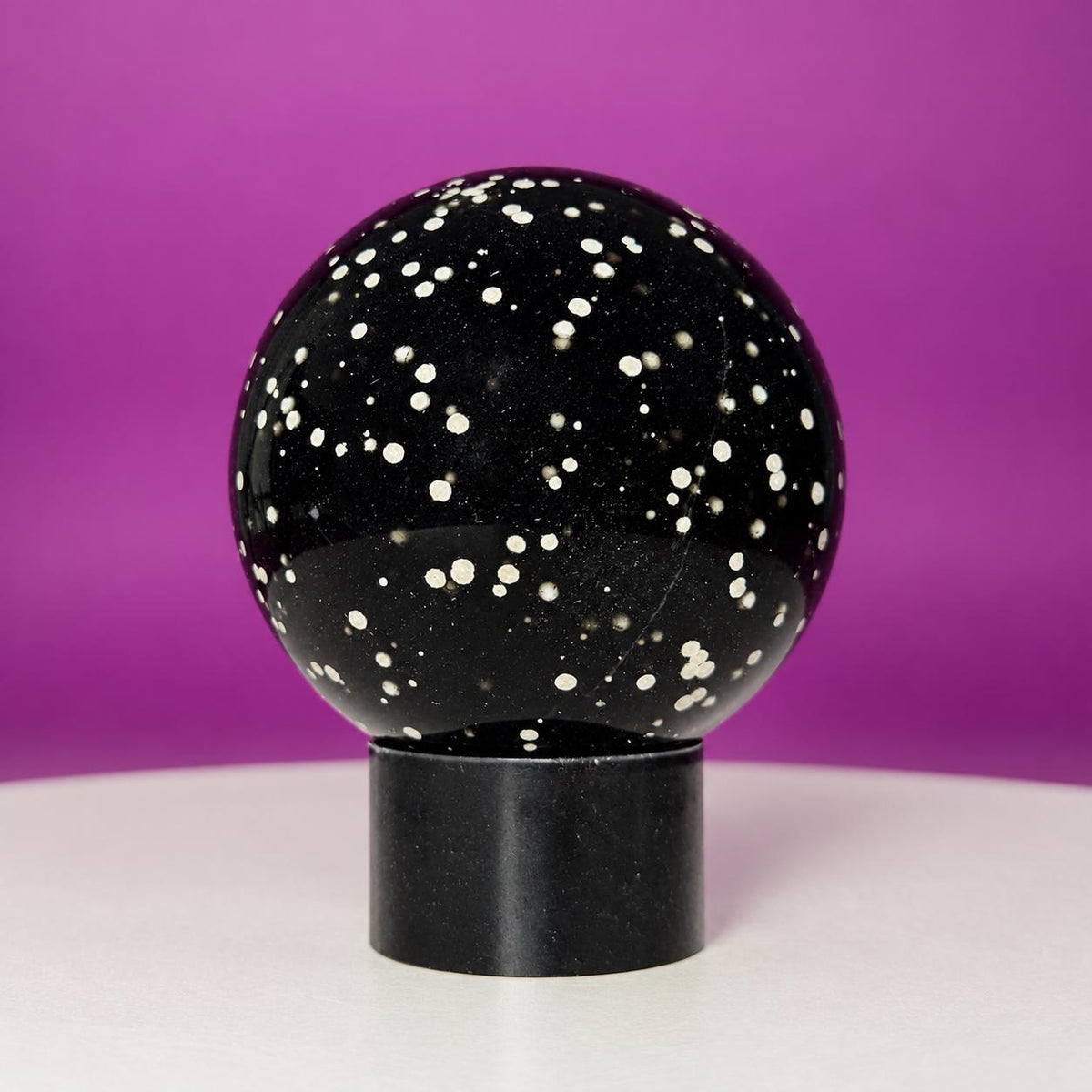 Stardust Obsidian Sphere on Black Acrylic Stand – 535g