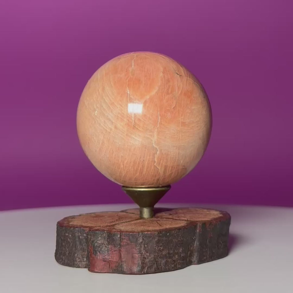Peach Moonstone Sphere on Decorative Wood Stand