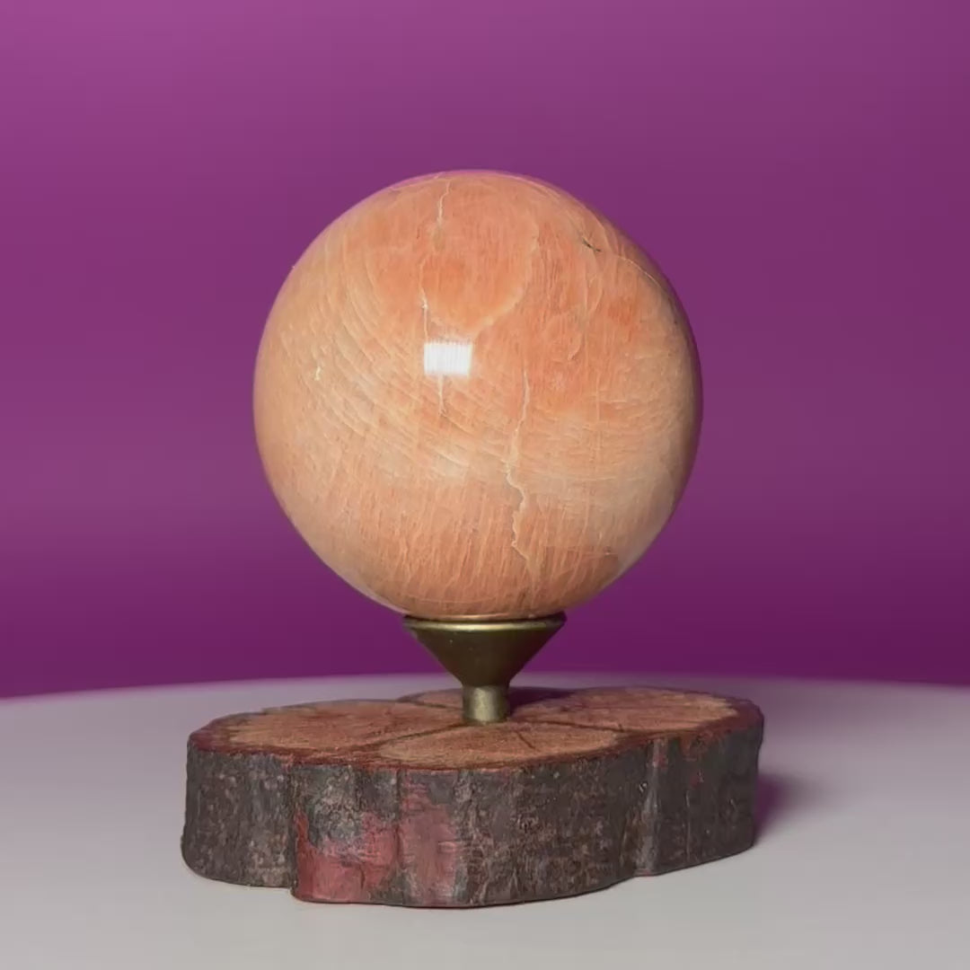Peach Moonstone Sphere on Decorative Wood Stand